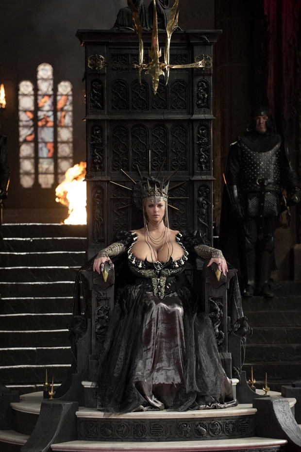 In this movie still of 'Snow White and the Huntsman' (2012) we see the evil Queen Ravenna (Charlize Theron) with her giant ballon breasts bulging out of her neckline. Cleavage has been morphed to fairy tale dimensions.